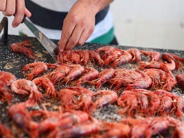 Garrucha prawns being prepared on a hot plate