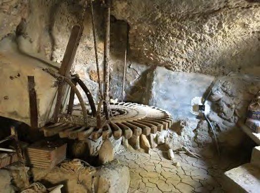 The mill's original wooden water-wheel, the rodezno, still in place